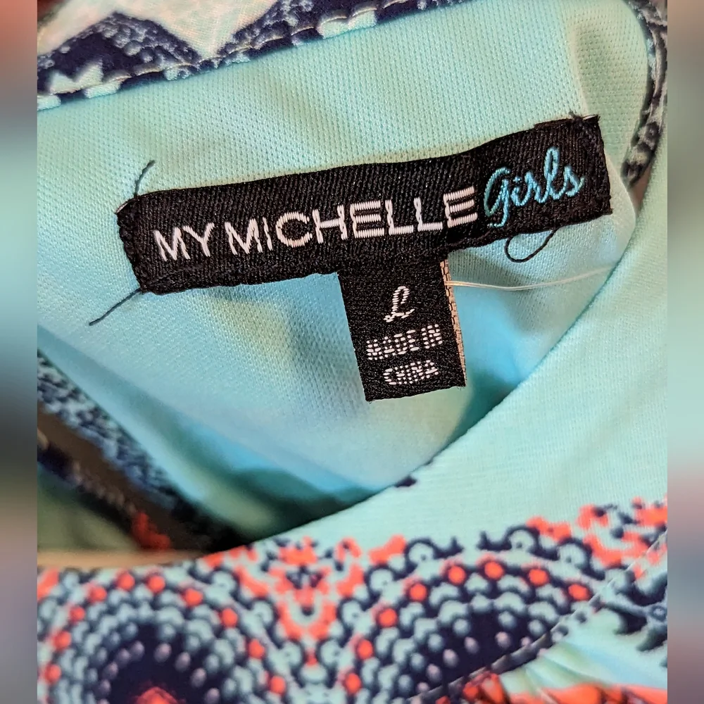 My Michelle girls blue multicolor romper open shoulders size large NWT
